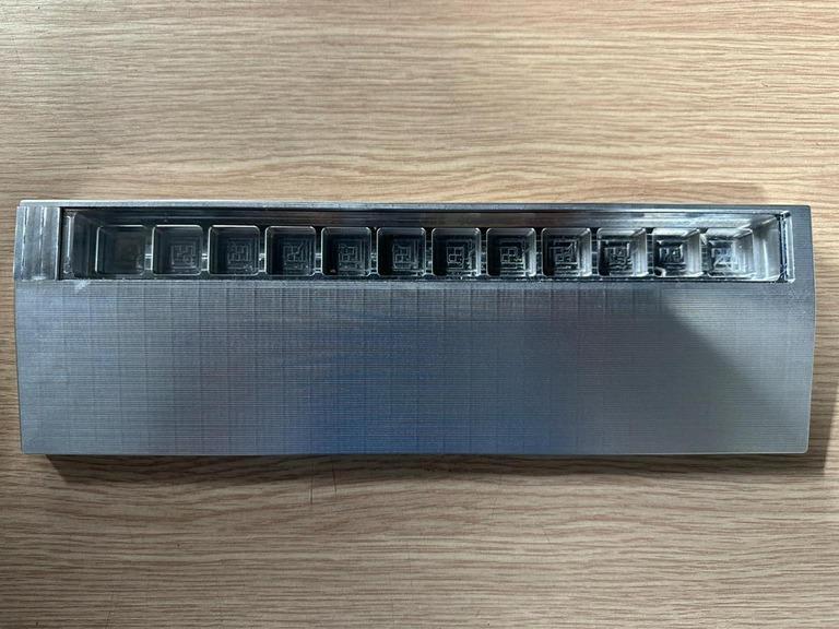 The Array Wrist Rest - Others interest check cover image featuring The Array, wrist rest, keyboard accessory, aluminum wrist rest, acrylic wrist rest, artisan keycap storage, customizable wrist rest