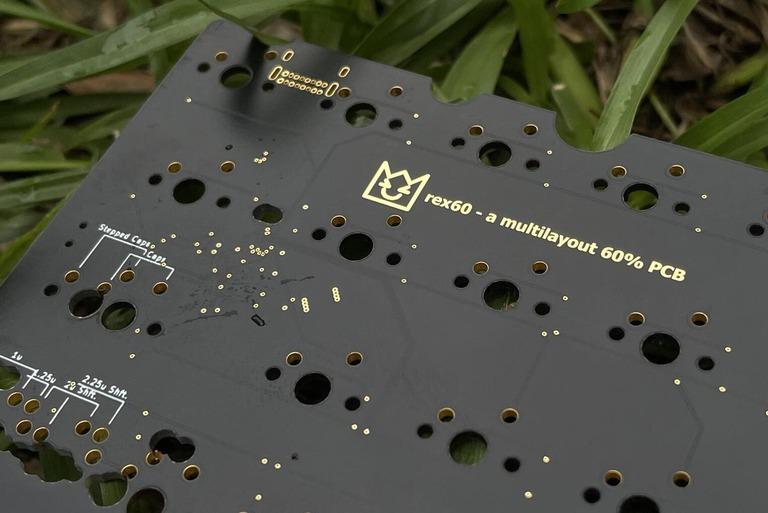 Rex60 - Others group buy cover image featuring Rex60, multilayout PCB, GH60 compatible, USB-C, pre-order, Swiss cheese PCB, rotary encoder, silkscreen layout assistance, Bakeneko60, Tofu60, keyboard case