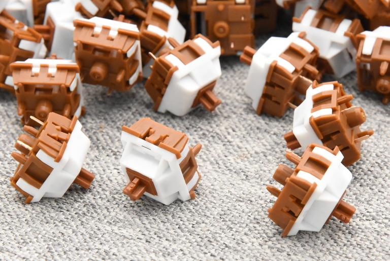 Unikeys X Keygeek Uni Linear Switch - Switches group buy cover image featuring Unikeys, Uni Linear Switch, Keygeek, linear switch, mechanical keyboard switch, PA12 housing, U4 stem, UPE blend, factory lubricated, GPL 205, GPL 105, thocky switch, smooth switch