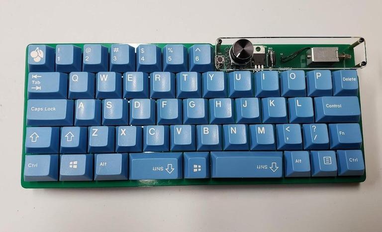 Clunker (IC) - Keyboard interest check cover image featuring MechWild, Clunker, 40% keyboard, half numrow, solenoid, knob, mechanical keyboard, Group Buy, QMK, VIA, VIAL
