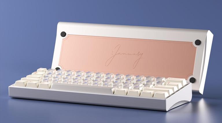 January 60% (GB) - Keyboard group buy cover image featuring January keyboard, 60% keyboard, O-ring mount, anodized aluminum, polycarbonate, custom PCB, group buy, mechanical keyboard, typing angle, RGB underglow