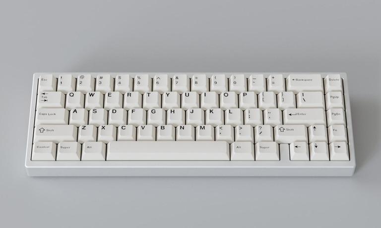 Krush65 (IC) - Keyboard interest check cover image featuring Krush65, mechanical keyboard, 65% keyboard, budget keyboard,  aluminum case, copper weight,  hotswap PCB, soldered PCB,  ISO layout, split backspace