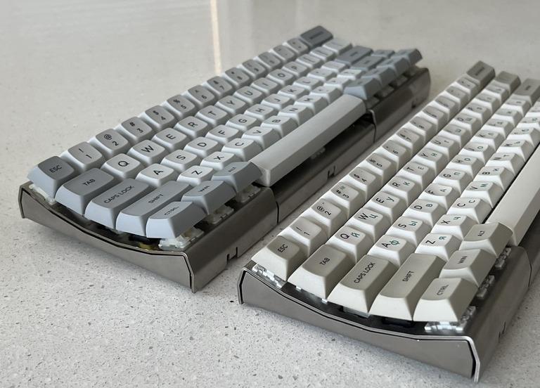 Curve0 - Keyboard group buy cover image featuring Curve0, curved keyboard, ergonomic keyboard, stainless steel keyboard, 60% keyboard, uniprofile keycaps, DSA, XDA, QMK, Vial,  custom keyboard