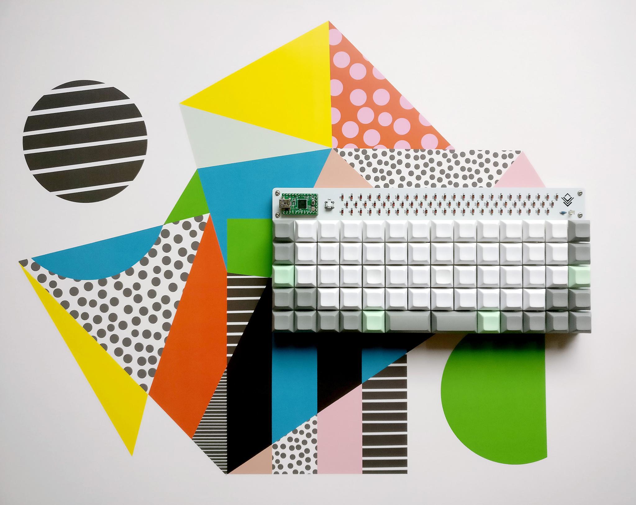 Quadrant (IC) - Keyboard interest check cover image featuring Quadrant, ortholinear keyboard, Plaid, The_RoMac, PCB design, QMK firmware, group buy, keyboard kit, MX switches, Kailh Choc switches, rotary encoder, WS2818B LED, Teensy 2.0, Elite-C microcontroller