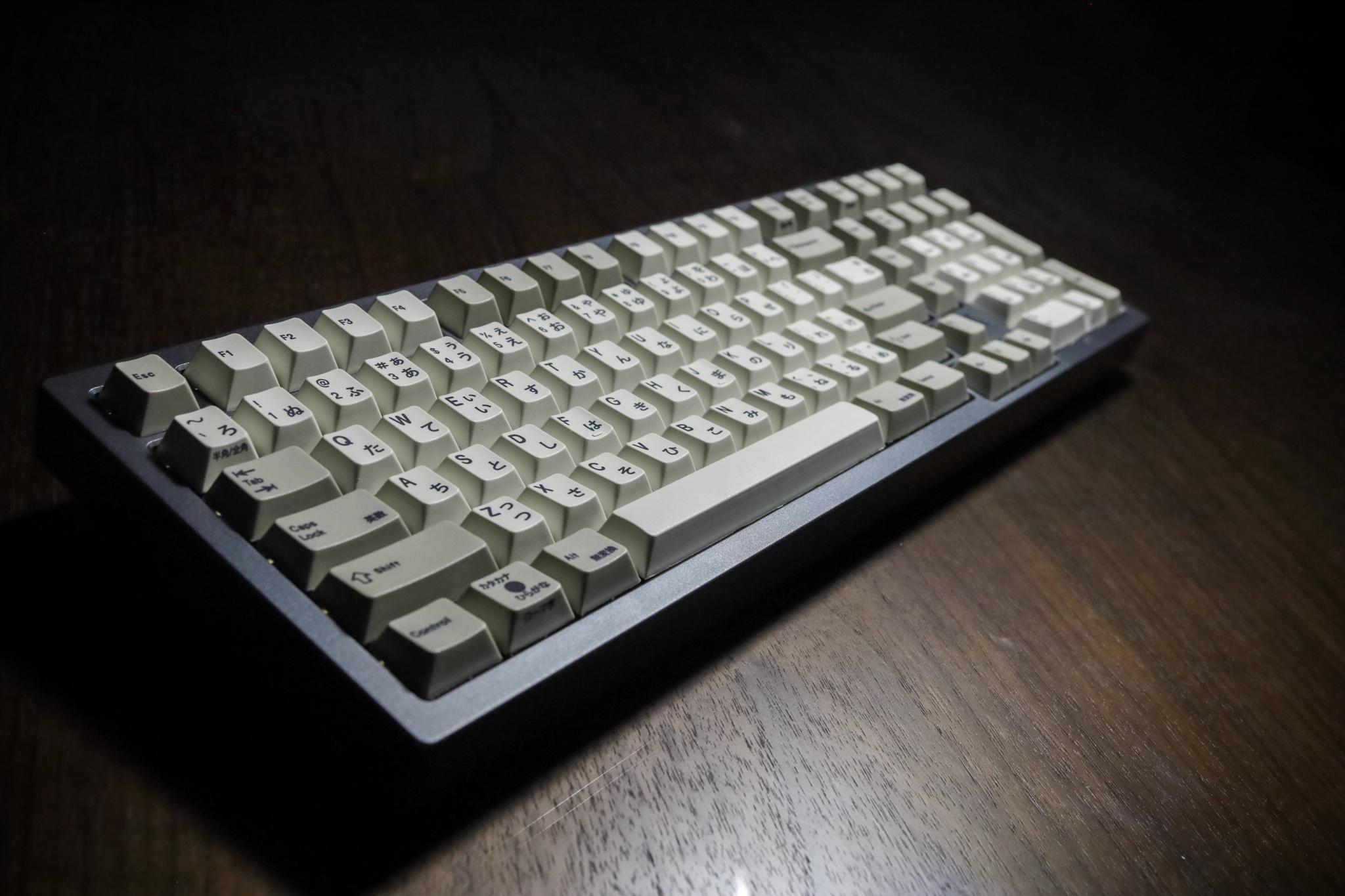 Austin - Compact Fullsize - Keyboard group buy cover image featuring Austin keyboard, compact fullsize, numpad, anodized aluminum, brass plate, QMK compatible, top mount, ergonomic design, customizable layout