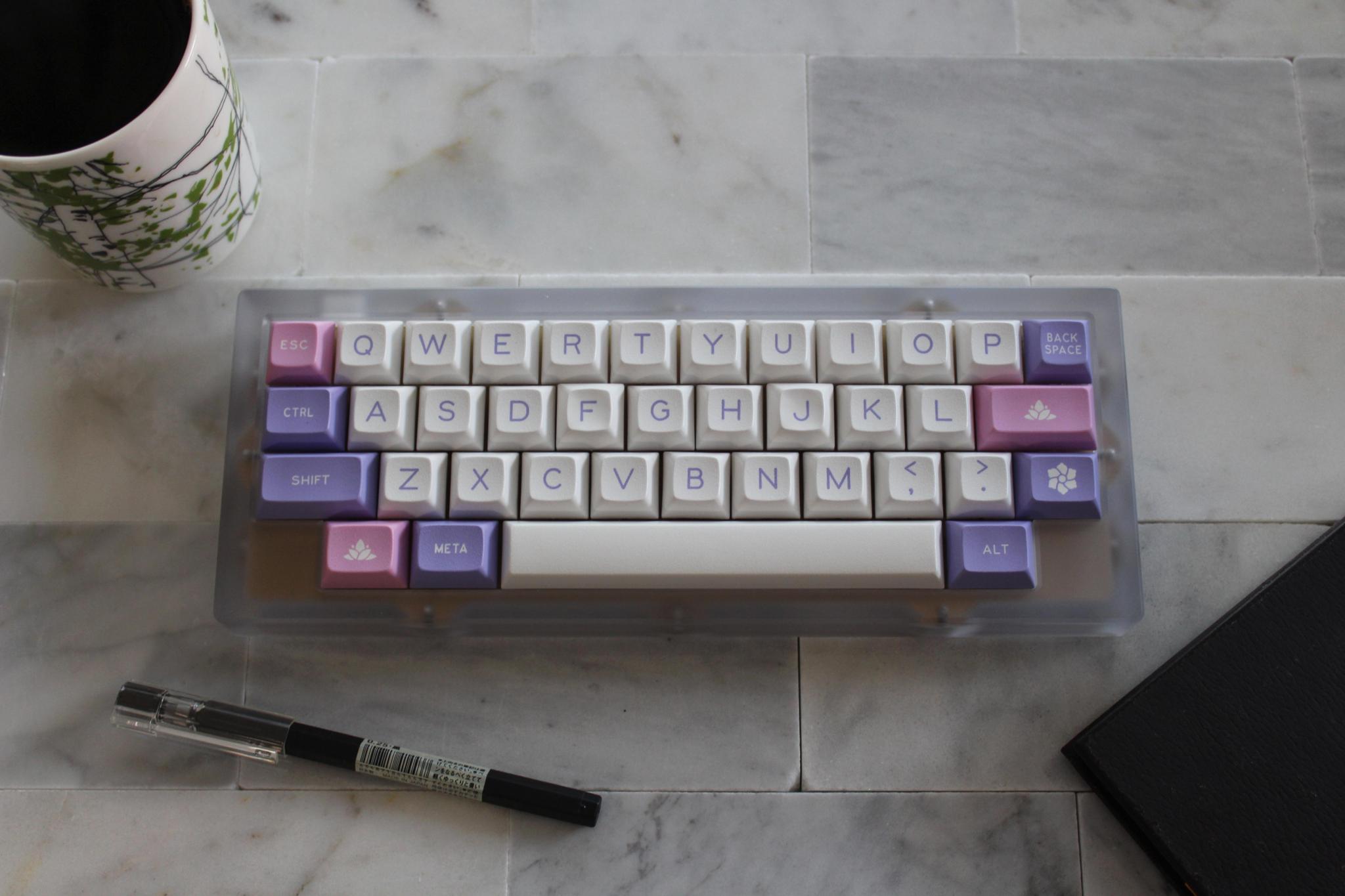 Neuron - Keyboard group buy cover image featuring Neuron, Group-Buy, GB, Golden Ticket, anodized aluminum, polycarbonate, QMK-compatible, custom keyboards, CNC machining, shipping updates