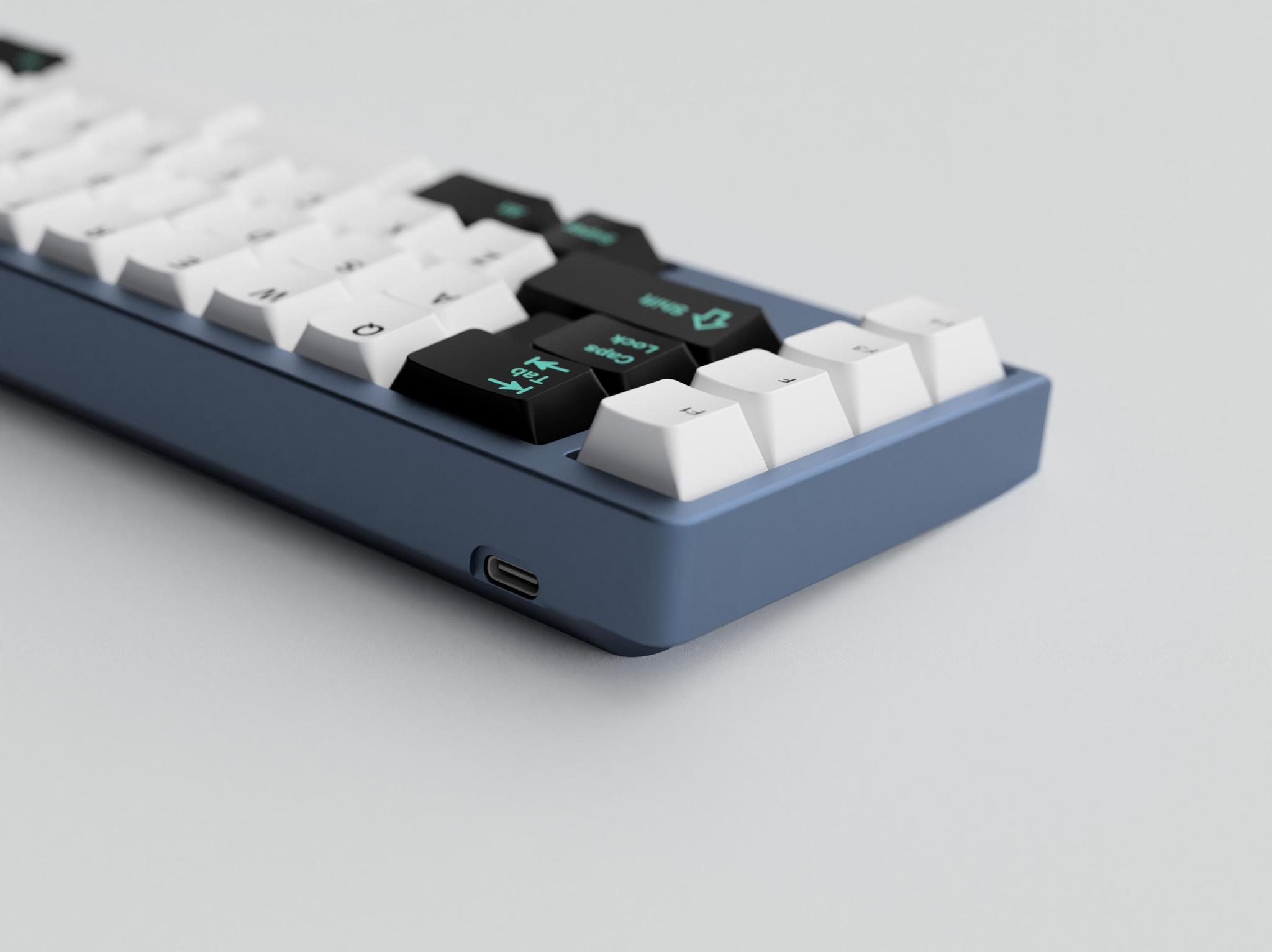 TMOv2 50% Keyboard (GB) - Keyboard group buy cover image featuring TMOv2, 50% keyboard, group buy, USB-C PCB, RGB LEDs, CannonKeys, MyKeyboard.EU, typing angle, aluminum, polycarbonate, brass weight