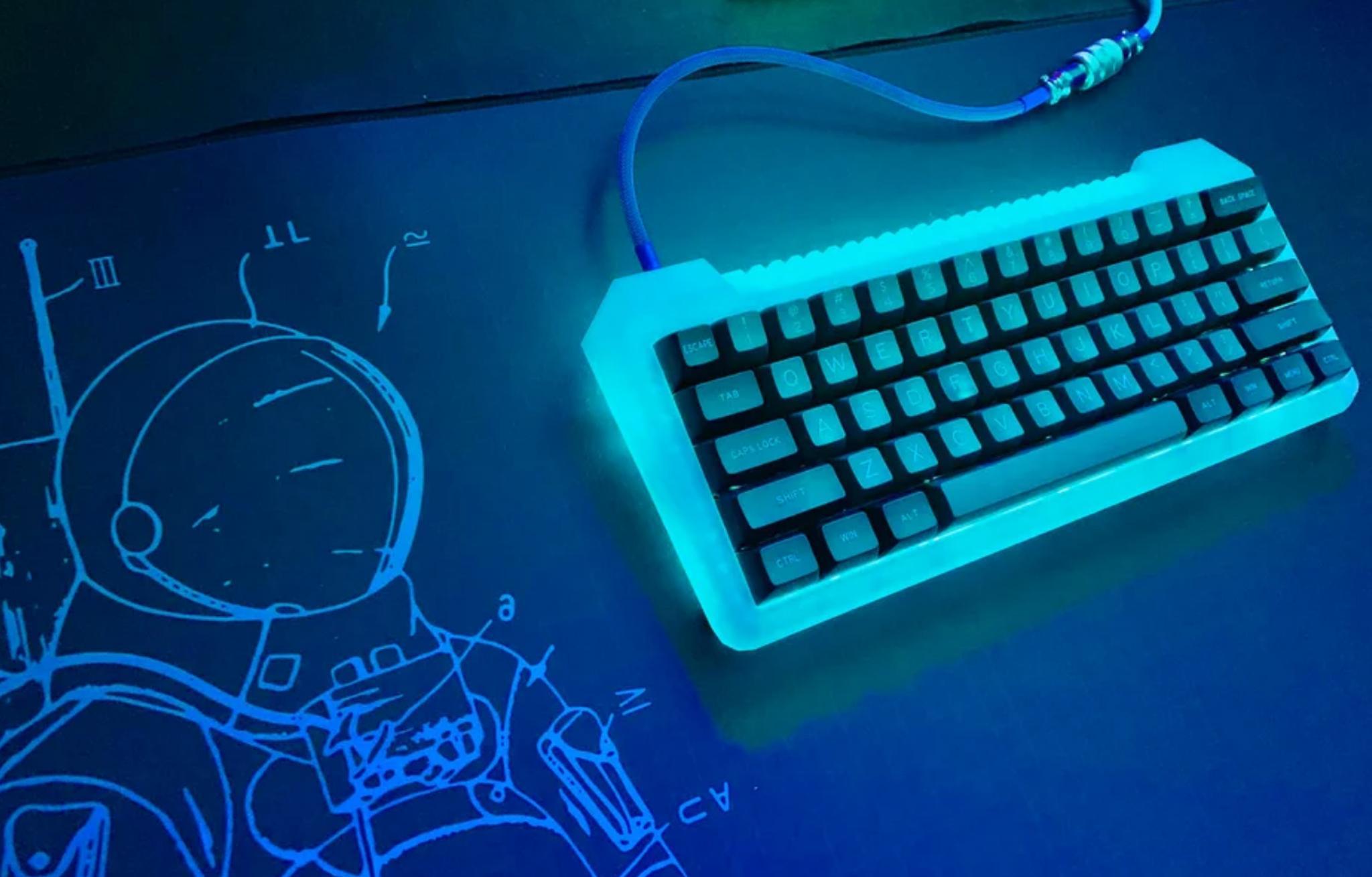 Glow Kits - 1984 Keyboardbelle Clear Case (IC) - Keyboard interest check cover image featuring Glow Kits, 1984 Keyboardbelle, Clear Case, DZ60 PCB, Cherry Stabilizers, Silver Aluminum Plate, Keyboardbelle Wedge, switches, LEDs, keycaps
