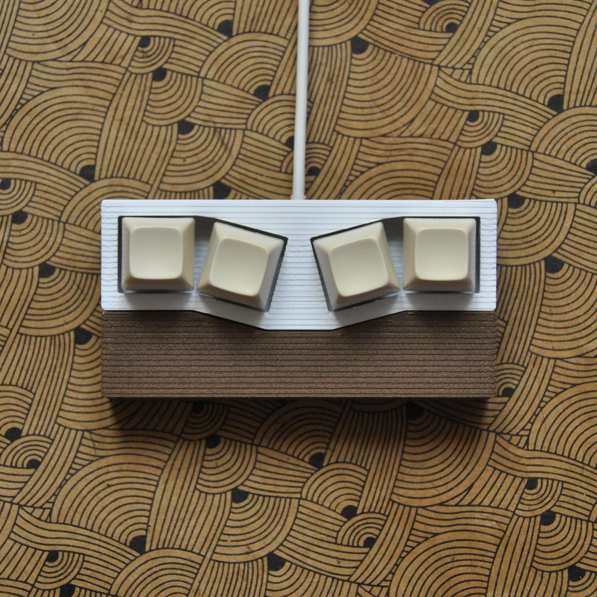 Drink Me (IC) - Keyboard interest check cover image featuring Drink Me, mechanical keyboards, macropad, 3D-printed, ergonomic design, custom keymaps, Kailh hotswap, QMK, VIA compatible, TGR Alice, Prime_e, Gateron switches