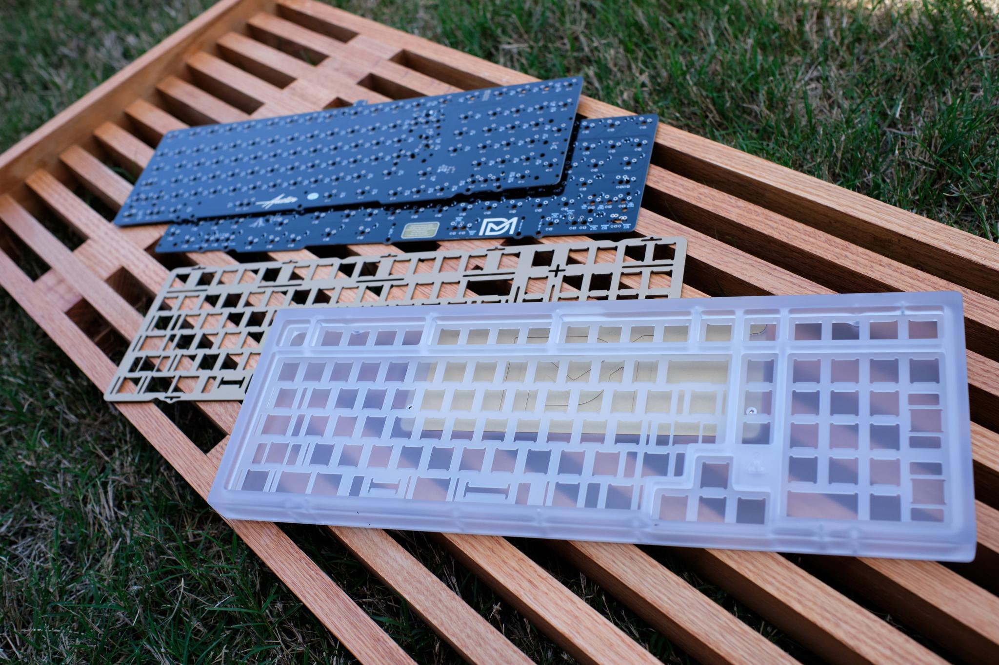 Austin R2 (IC) - Keyboard interest check cover image featuring Austin R2, R1 vs R2, MechsOnDeck, TopClack, Polycarbonate Austin, Group Buy, IC form, PCB, QMK compatible, top mounted, prototyping, anodization, keyboard enthusiasts
