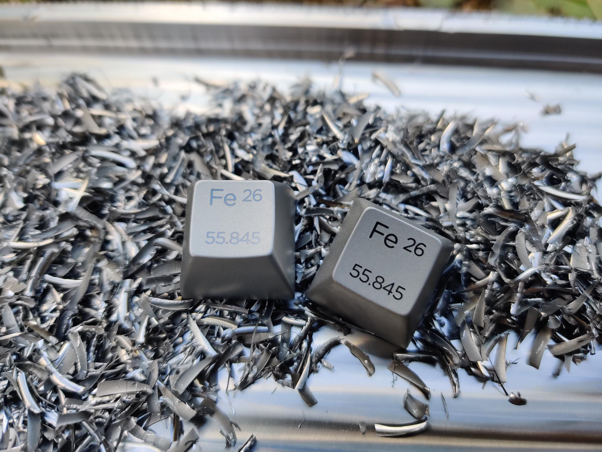 KAT Iron (IC) - Keycap interest check cover image featuring KAT Iron, group buy, stainless steel, Phoenician alphabet, keycap set, keyboard accessories, deskmat, geekhack, novelty keys