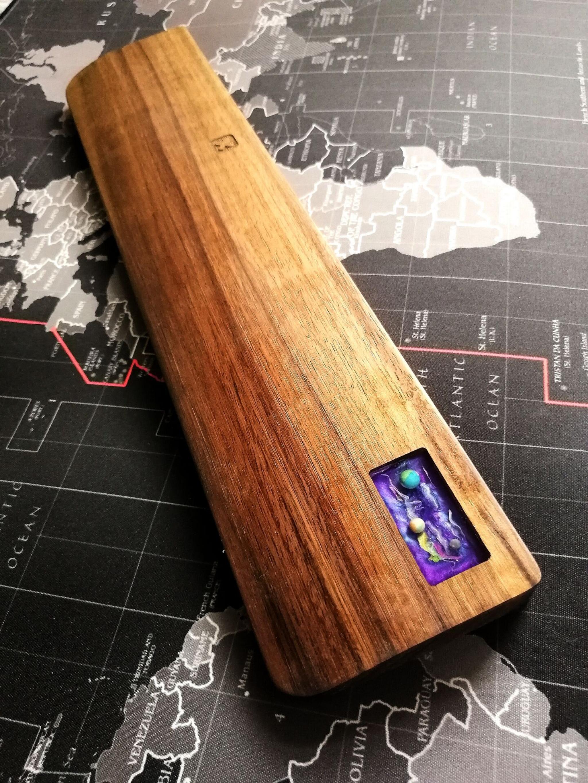 Stunning Planet Walnut Wood Palm Rest - Uncategorized group buy cover image featuring palm rest, keyboard accessory, walnut wood, group buy, limited edition, black walnut, resin, brass weight, international shipping