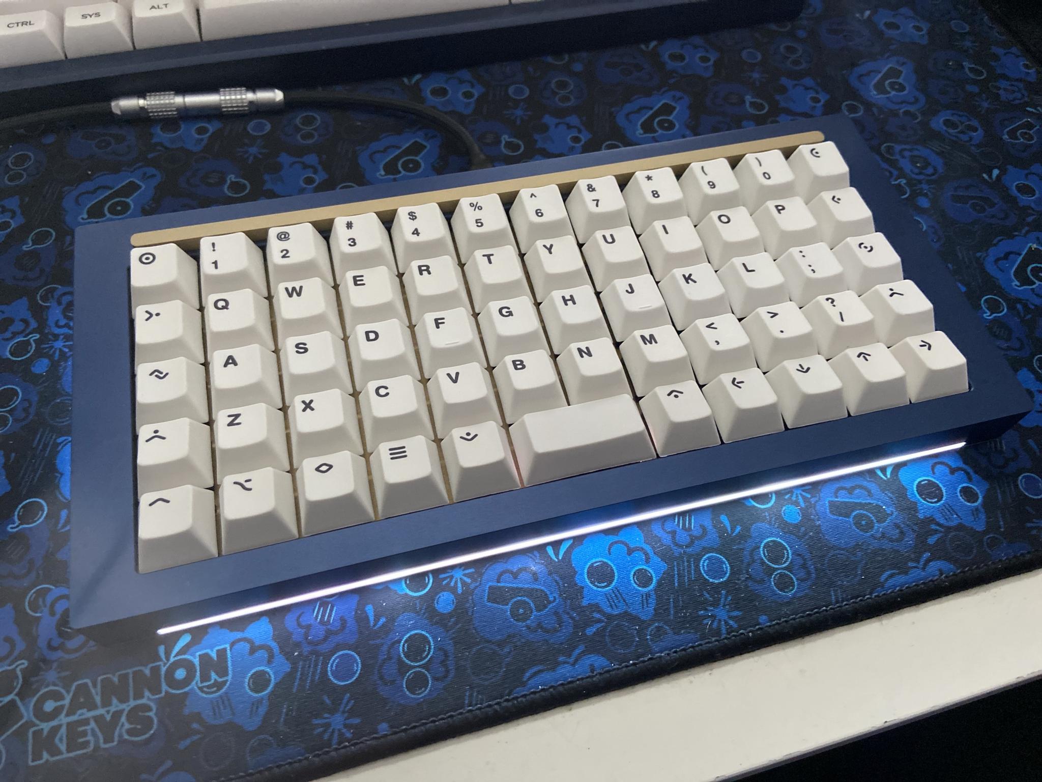 Atlas - Uncategorized group buy cover image featuring Atlas, ortholinear, keyboard, CannonKeys, MyKeyboard, LED underglow, QMK compatible, open source, hotswap
