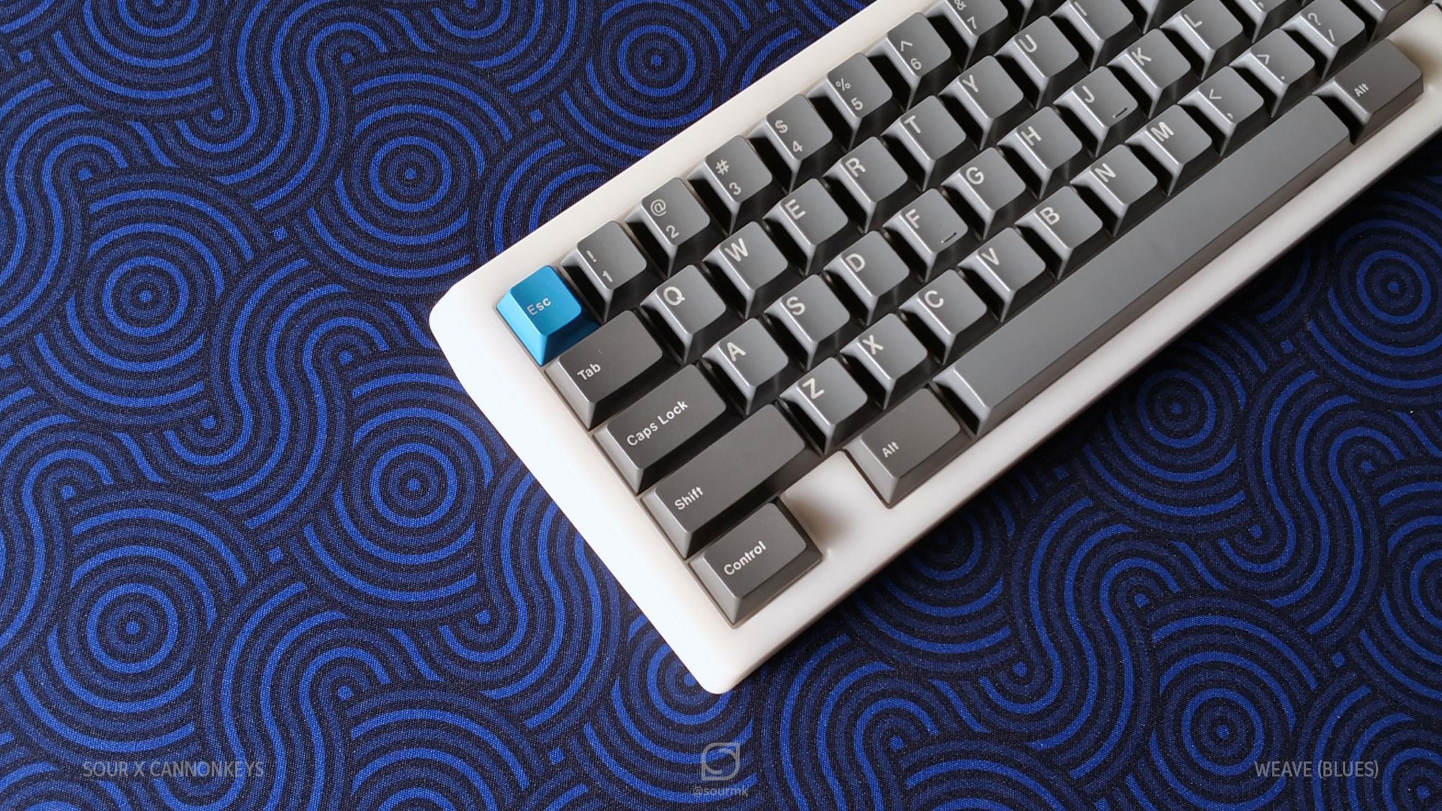 Weave Deskmats - Uncategorized group buy cover image featuring Weave deskmat, Cannon Keys, group buy, geometric pattern, pre-order, desk setup, color variants, desk accessory