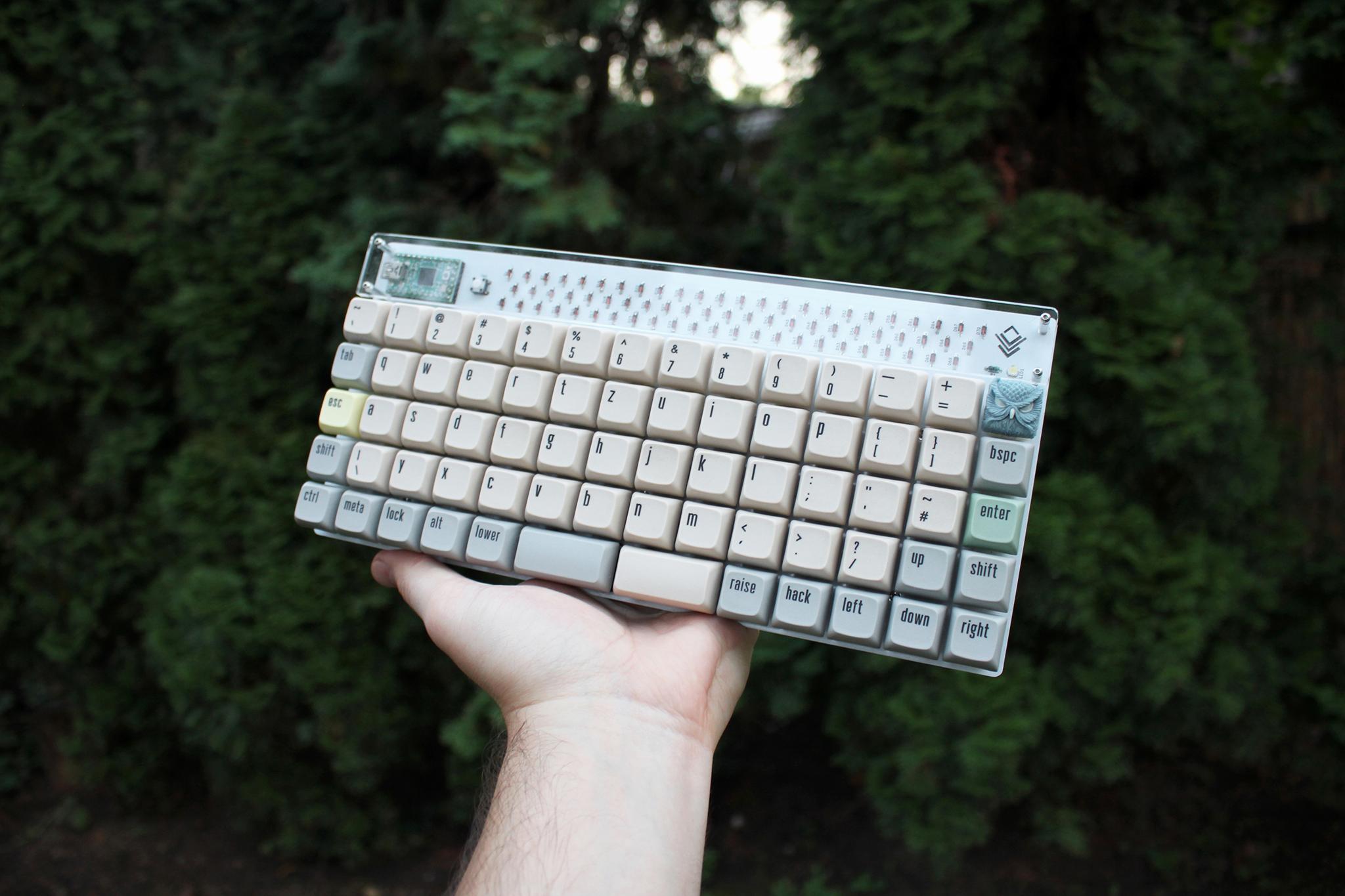 Quadrant R2 - Uncategorized group buy cover image featuring Quadrant R2, ortholinear keyboard, 5x14 matrix, keyboard extras, group buy, Elite-C microcontroller, QMK firmware, VIA support, MX-style switches, Alps switches, Kailh Choc switches, rotary encoder, PCBs, acrylic case, LED strip, transparent polycarbonate, black PCB, white PCB