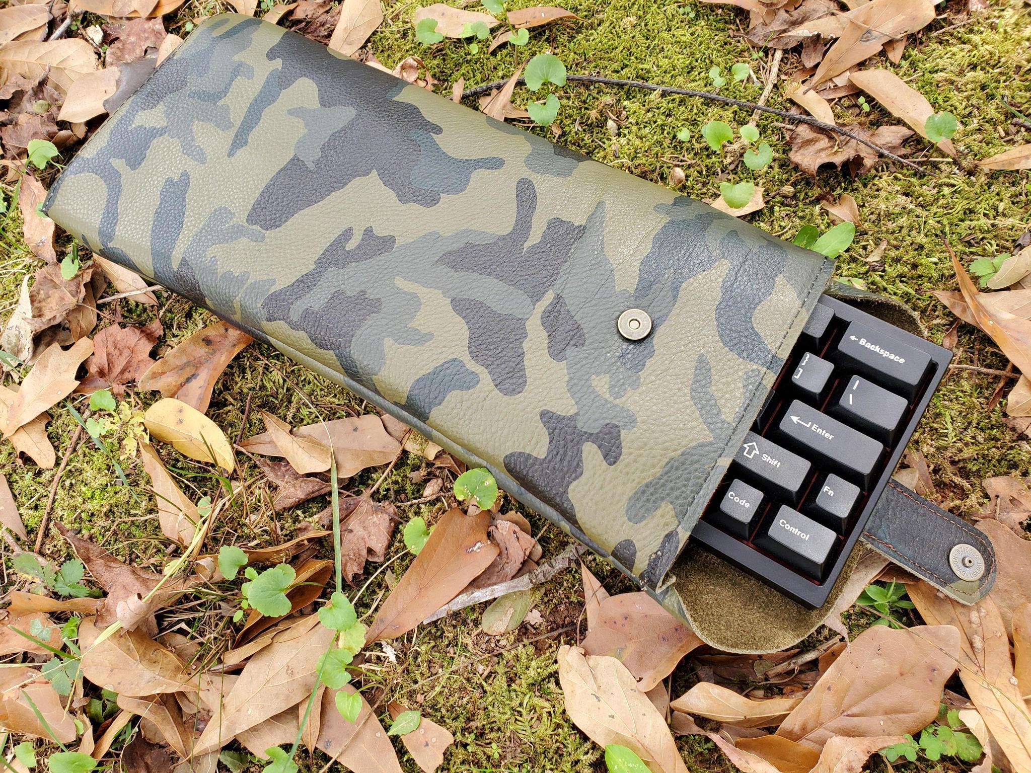 Invisible Leather Keyboard Sleeves (IC) - Deskmat & Accessories interest check cover image featuring keyboard sleeves, leather, padded, canvas lined, South Carolina, black leather, brown leather, woodland camo, Carolina Mech Store