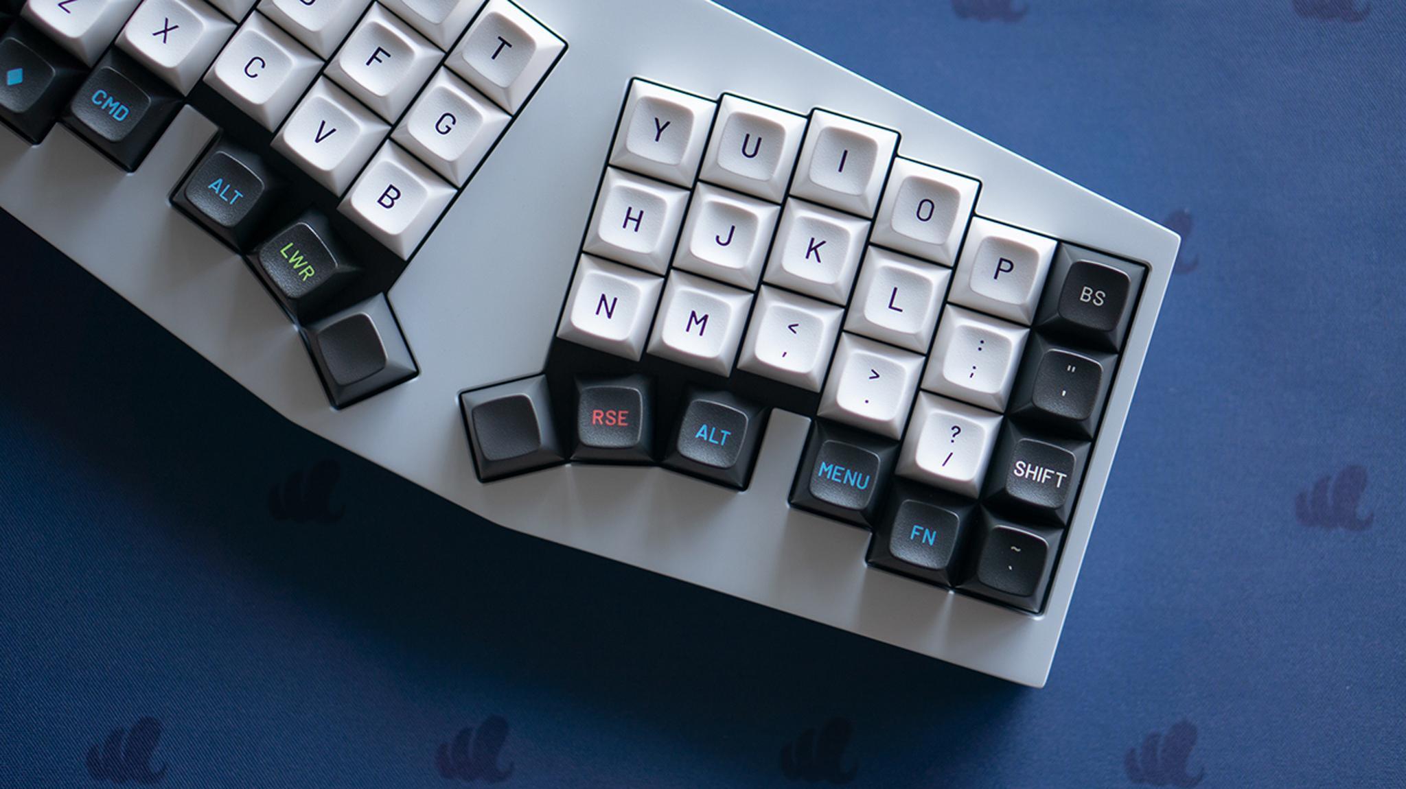 Cornelius (IC) - Keyboard interest check cover image featuring Cornelius, 40% keyboard, gasket mounted, column staggered, foostan, Corne Keyboard, ergonomic, anodized aluminum, hotswap PCB, USB-C, VIA support