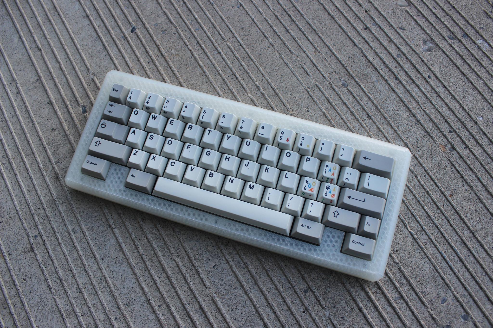 PLA60 (IC) - Keyboard interest check cover image featuring PLA60, PLA75 R2, 3D printed keyboard, Calgary, gasket mount, RGB diffusion, QMK, VIA, customizable keyboard, Canadian design