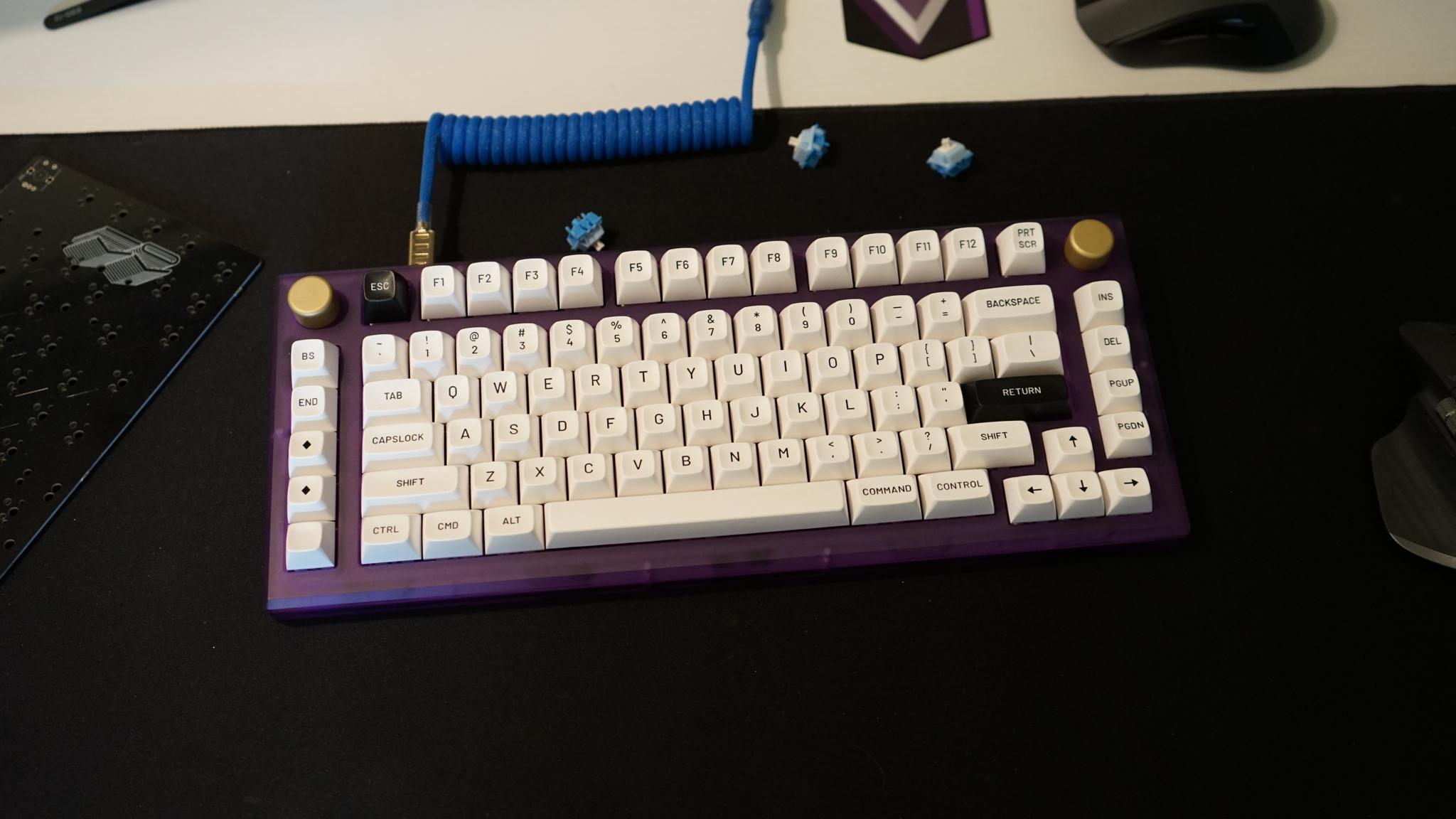 Polycarbonate KL-90 (IC) - Keyboard interest check cover image featuring Polycarbonate KL-90, keyboard, interest check, group buy, gasket mounted, QMK VIA support, hotswap versions, split-spacebar, ISO support, typing angle, USB-C, open source, rotary encoder, OLED