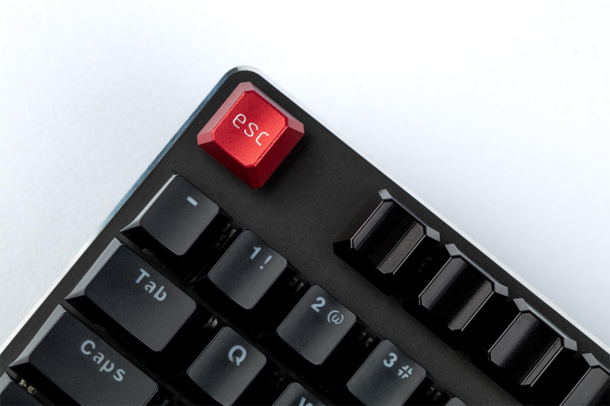 Kaidesk ALU Red Esc Keycap (IC) - Keycap interest check cover image featuring Kaidesk, ALU Red, Esc Keycap, CNC machined, aluminium keycaps, artisan keycap, Mechboards UK, anodised red
