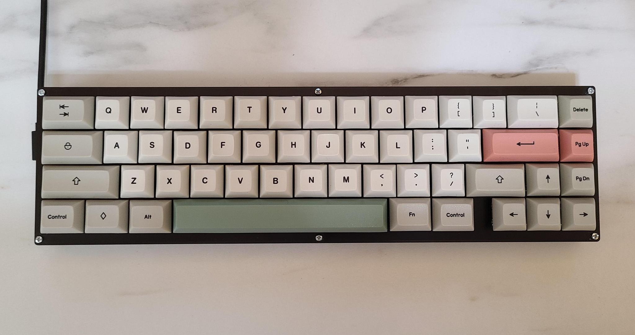 Rocky Elbert (IC) - Keyboard interest check cover image featuring Rocky Elbert, 45% keyboard, budget keyboard, keycap compatibility, PCB assembly, pro micro, FR4 case, keyboard kit, 65% layout, soldering, keyboard building, QMK, VIA