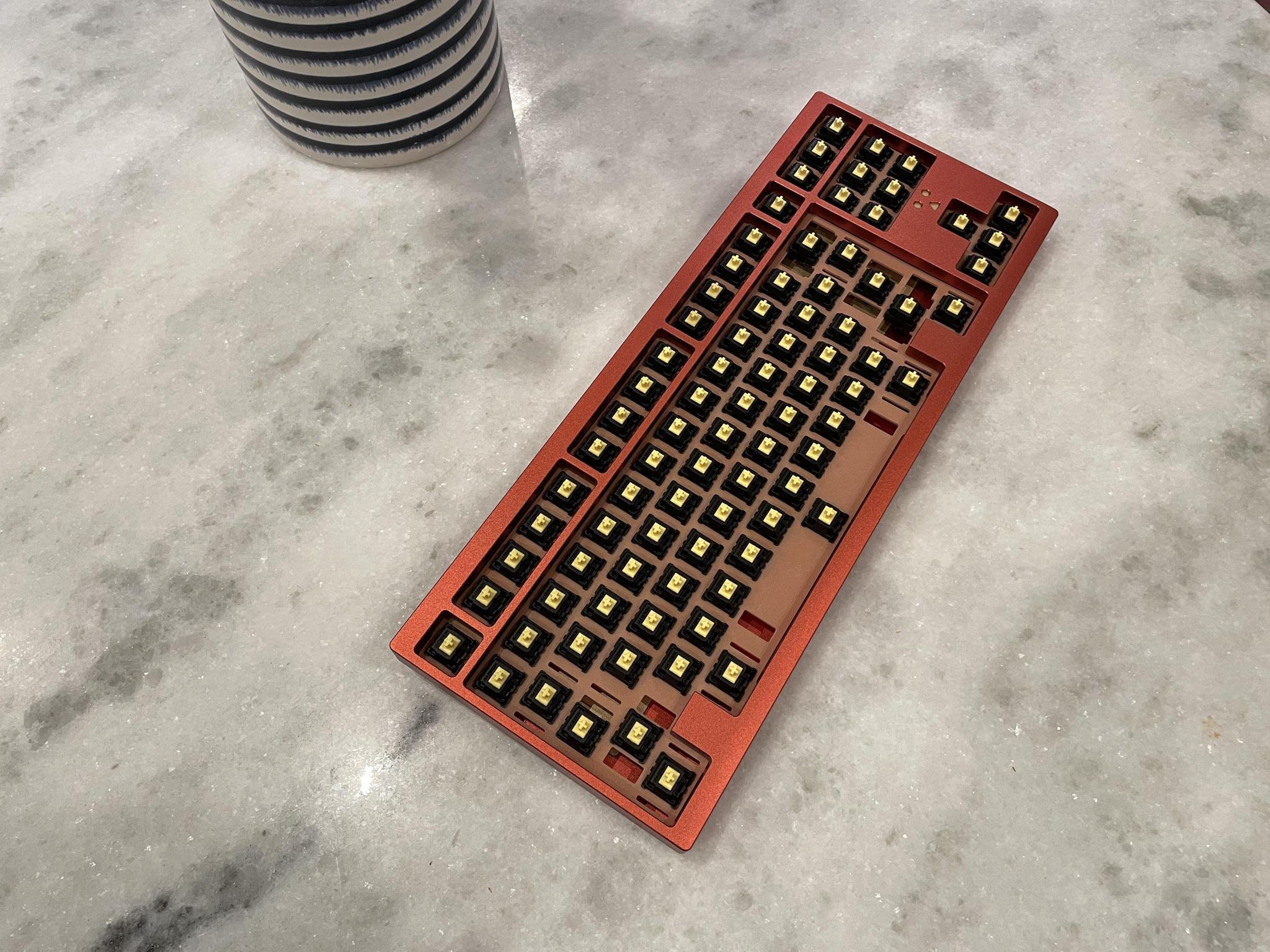 Elite - F13 TKL (IC) - Keyboard interest check cover image featuring Elite F13, TKL, top mount, gummy mount, keyboard, proto pictures, engravings, front height, wakipai energy