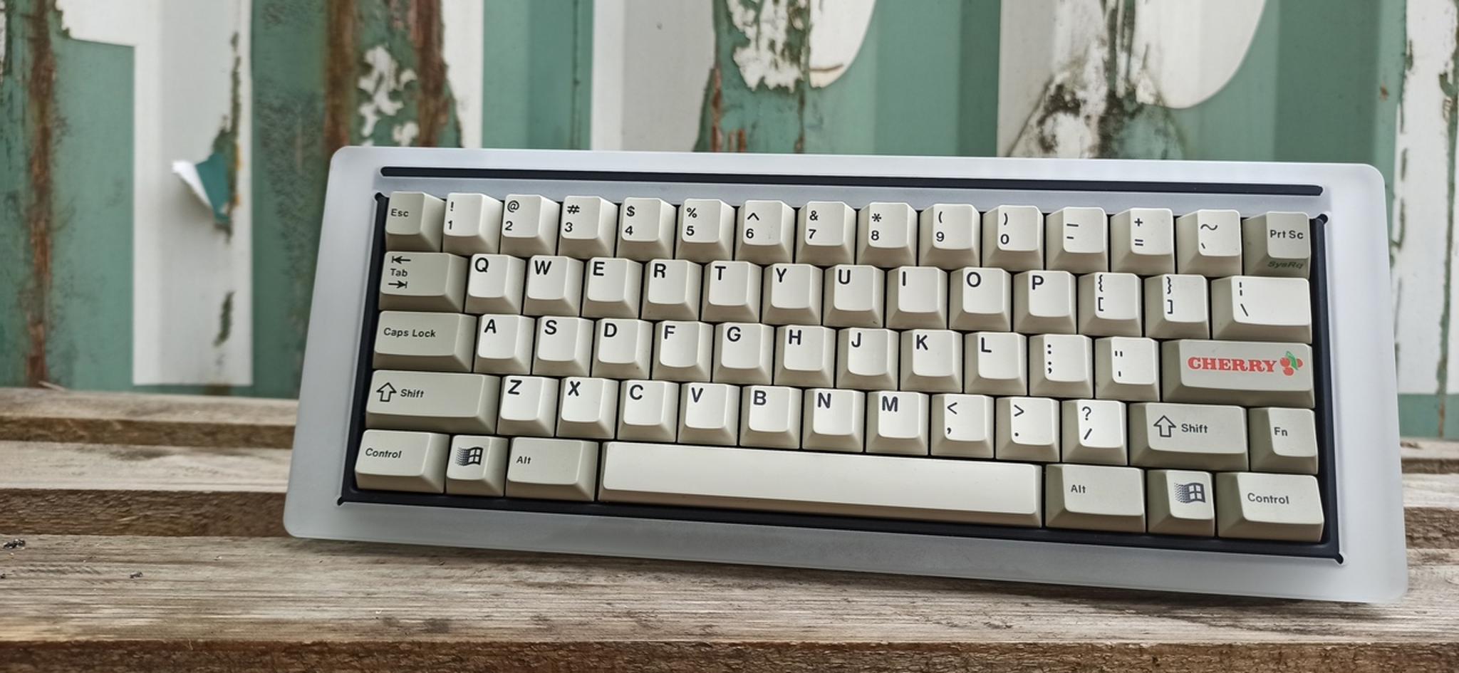 Compound 60 (GB) - Keyboard group buy cover image featuring Compound 60, keyboard, CNC anodized aluminium, Tsangan layout, backside mount, QMK/VIA, USB Type-C