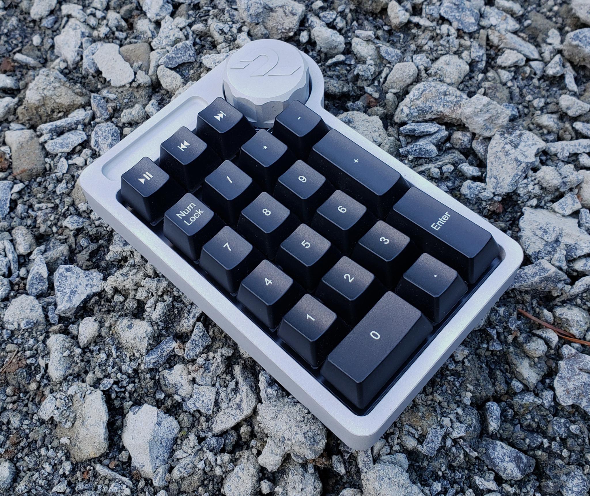 RM-Numpad (IC) - Keyboard interest check cover image featuring RM-Numpad, keyboard, numpad, aluminum case, Pacific Northwest, prototype, QMK layouts, PCB, USB-C, anodized, IC form, manufacturing, product update