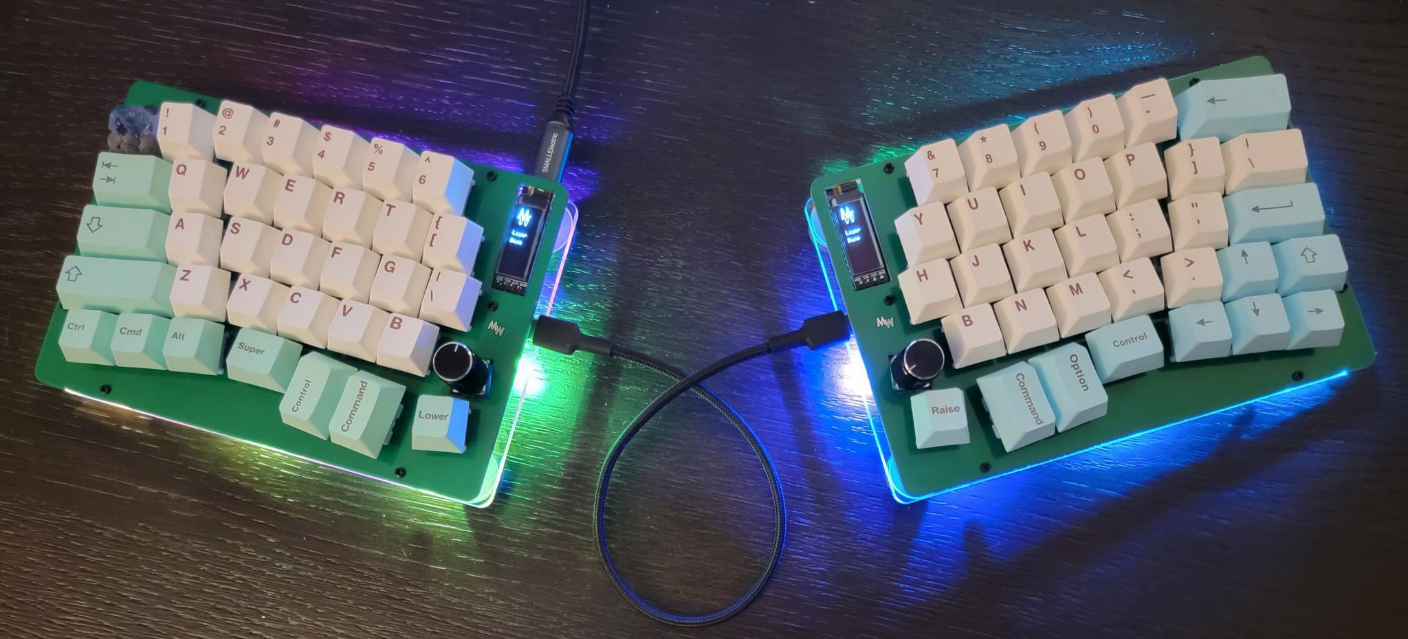 Mokulua - 65% Alice-like (IC) - Keyboard interest check cover image featuring Mokulua, MechWild, split board, 65% Alice-style, USB-C, Pro Micro, FR4, acrylic, RGB LEDs, QMK, VIA