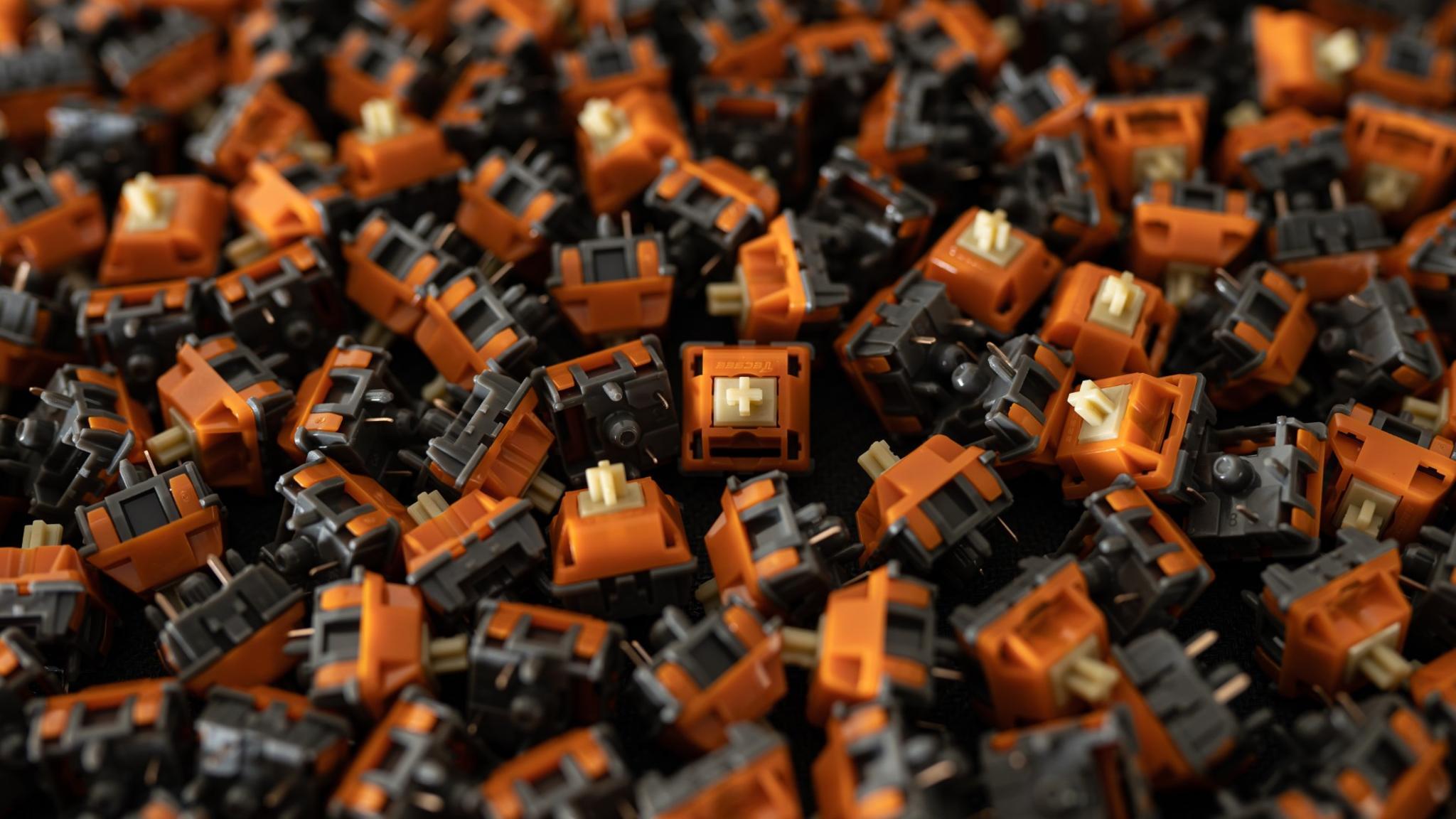 Safety Linear Switches (IC) - Switches interest check cover image featuring Safety Switches, linear switches, Tecsee, typing experience, UPE mix, low sound volume, open workspace, poppy sound, keyboard enthusiasts